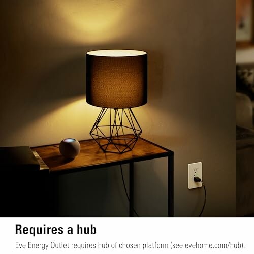 Modern lamp on table with smart plug and hub